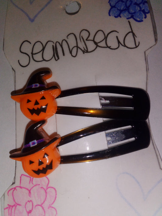 Orange pumpkin with black hat (brown trim)