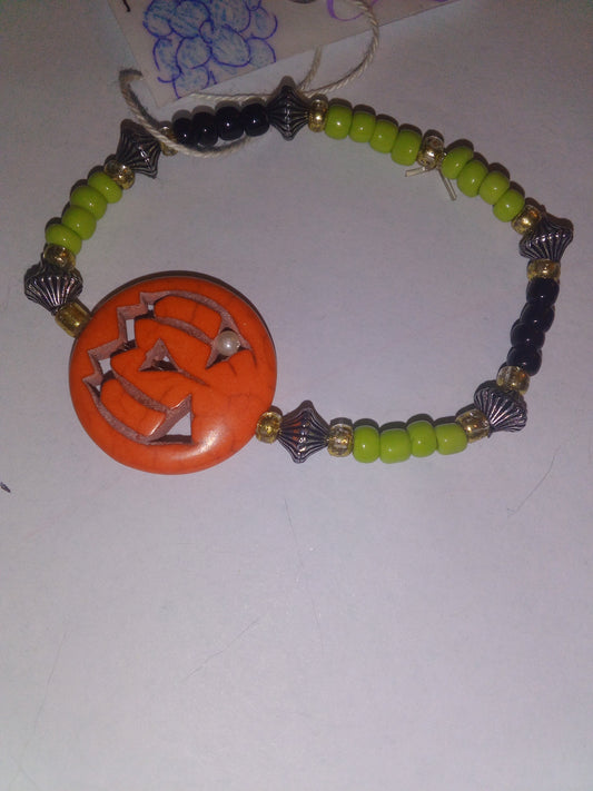 Pumpkin with light green/black seed beads
