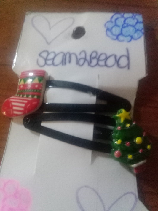 Red colorful stocking with green tree with a yellow star
