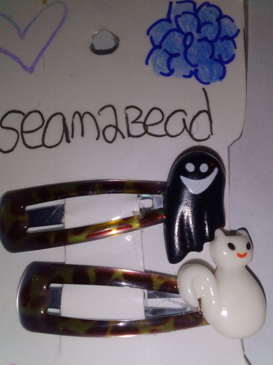 Black skinny ghost with white face with white cat