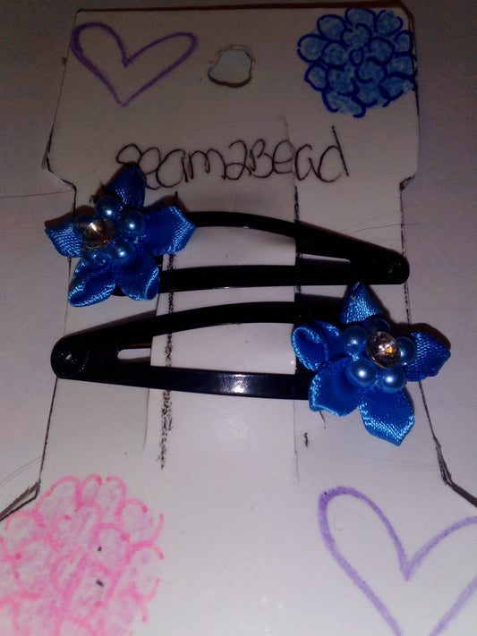 Blue flower ribbon with beads clear gem