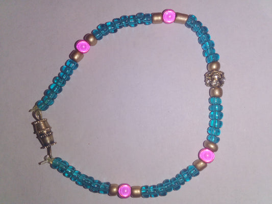 Teal seed beads with gold seed beads with pink spacer beads