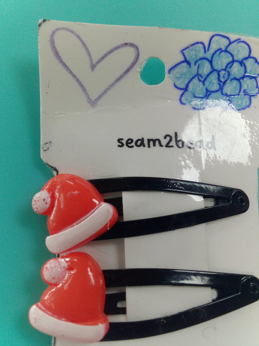 (2) Santa hat with white trim and white cotton ball