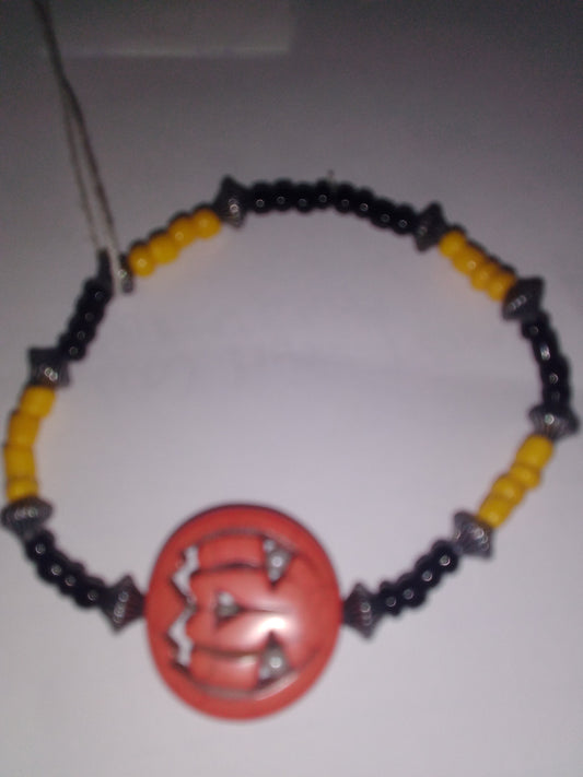 Skiver/yellow seed beads with pumpkin bead
