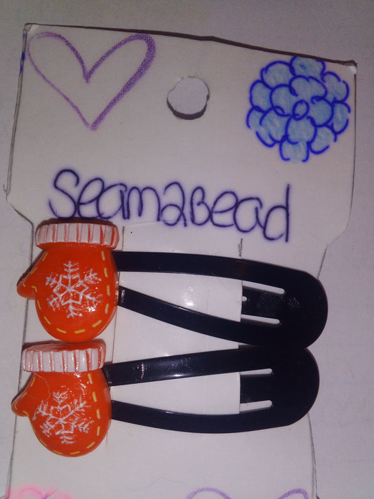 (2) red mittens with white snowflake