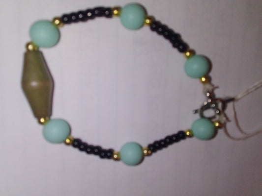 Black seed beads with seaweed beads balls with sliver spacer bead with dark green bead